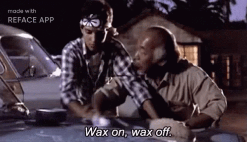 Two Men Are Waxing A Car And One Of Them Is Saying `` Wax On , Wax Off '' . GIF