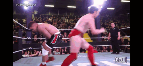 Two Men Are Wrestling In A Ring With Ggw Written On The Bottom Of The Screen GIF