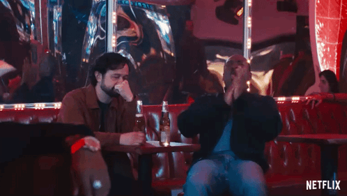 Two Men at Bar With Netflix