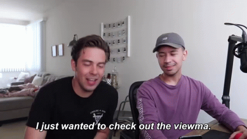 Two Men At Microphone Talking GIF