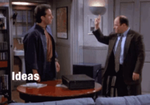 Two Men at Table With Ideas