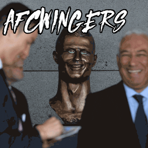Two Men Beside Statue With afcwinger 's