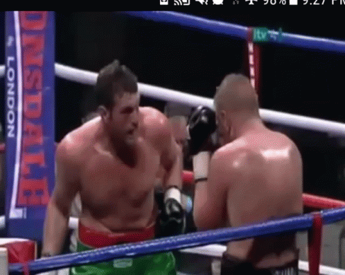 Two Men Boxing In A Ring With A Banner That Says ' Lonsdale ' On It GIF