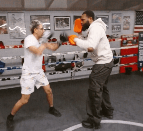 Two Men Boxing in Boxing Ring Title Boxing