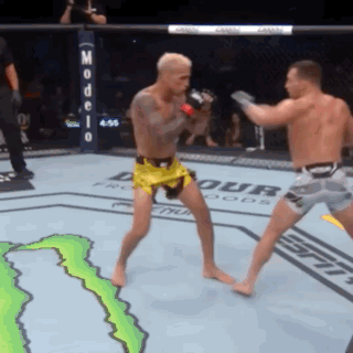Two Men Boxing in Monster Energy Ring