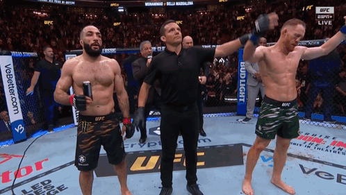 Two Men Boxing In Ring With Bud Light Sign GIF