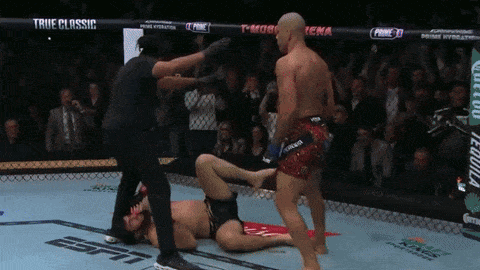 Two Men Boxing in Ring With True Classic