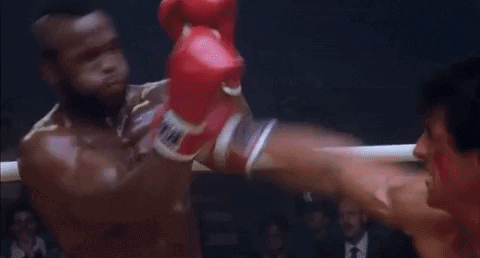 Two Men Boxing in Ring