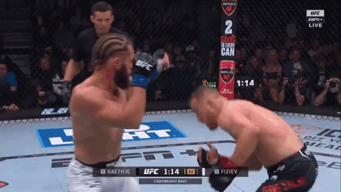 Two Men Boxing Ring Shots in Every Can