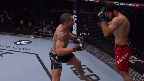 Two Men Boxing With Monster Energy Logo GIF