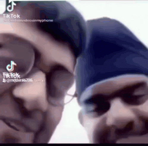 Two Men Close Up With TikTok Written Below