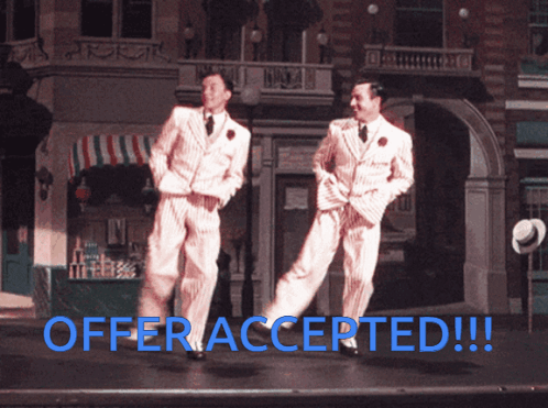 Two Men Dancing On Stage Offer Accepted GIF