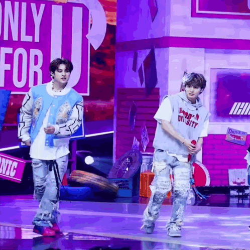 Two Men Dancing On Stage Saying Only For U GIF