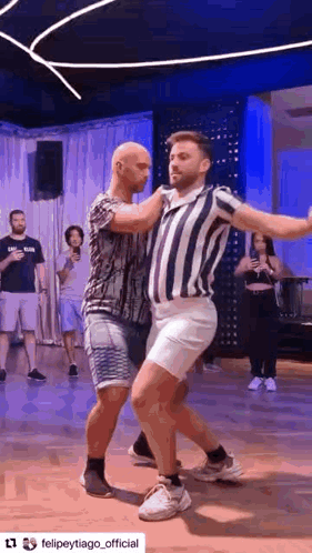 Two Men Dancing Together in Dance Studio