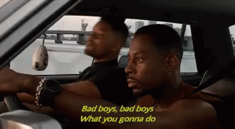 Two Men Driving Bad Boys Bad Boys What You Gonna Do