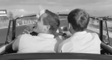 Two Men Driving Car On Highway GIF