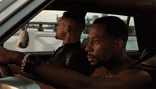 Two Men Driving in Car Saying Forsru