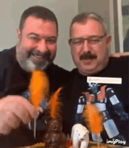 Two Men Eating Carrots With Polar Bear GIF