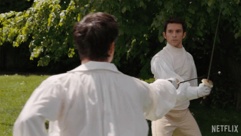 Two Men Fencing In Park Netflix GIF
