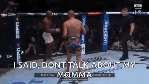 Two Men Fighting and Talking in Boxing Ring