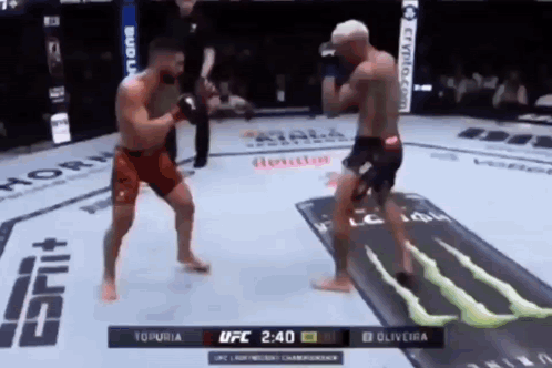 Two Men Fighting Boxing Ring Monster Energy Logo