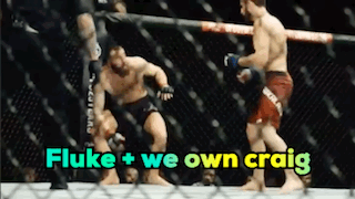 Two Men Fighting In A Cage With The Words Fluke + We Own Craig GIF