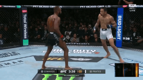 Two Men Fighting In Boxing Ring GIF