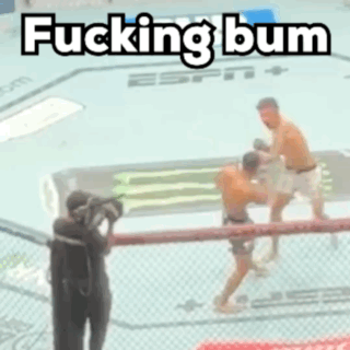 Two Men Fighting in Boxing Ring