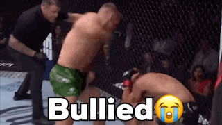 Two Men Fighting In Boxing Ring Bullied GIF