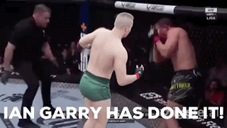 Two Men Fighting In Boxing Ring Ian Garry Has Done It GIF