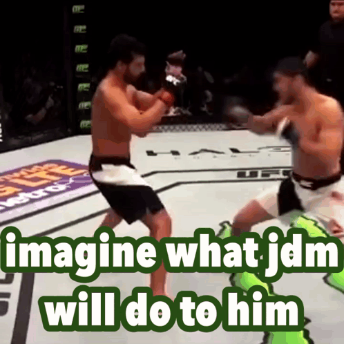 Two Men Fighting In Boxing Ring GIF