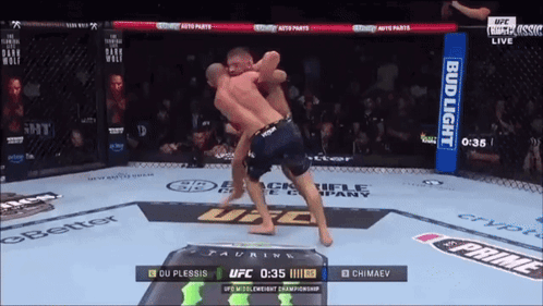 Two Men Fighting In Boxing Ring GIF