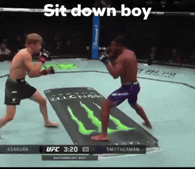 Two Men Fighting In Boxing Ring Sit Down Boy GIF
