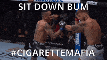 Two Men Fighting In Boxing Ring Sit Down Bum GIF