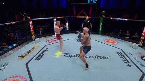 Two Men Fighting in Boxing Ring Sponsored by ZipRecruiter and Modelo