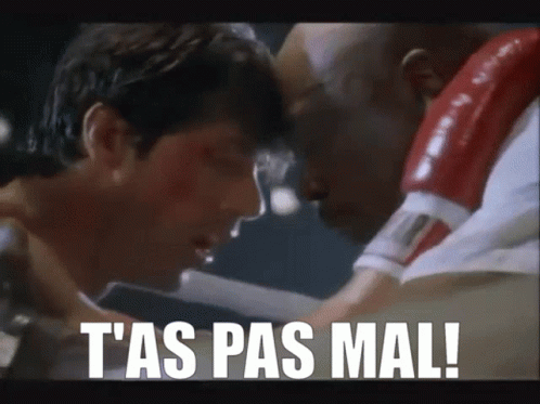 Two Men Fighting in Boxing Ring T'as Pas Mal
