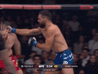 Two Men Fighting In Boxing Ring UFC 3:34 GIF