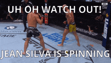 Two Men Fighting in Boxing Ring Uh Oh Watch Out Jean Silva Is Spinning