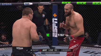 Two Men Fighting in Boxing Ring With 1:52 Left