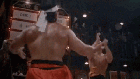 Two Men Fighting in Boxing Ring with Flame