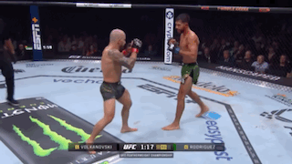 Two Men Fighting in Boxing Ring with Monster Energy