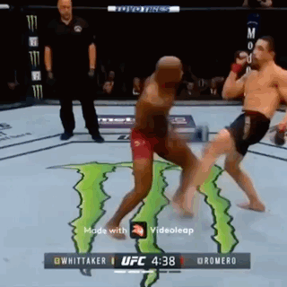 Two Men Fighting In Boxing Ring With Monster Energy Logo GIF