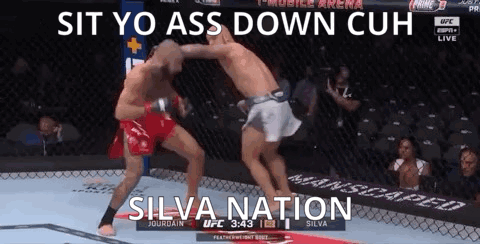 Two Men Fighting in Cage Saying Sit Yo Ass Down Cuh Silva Nation