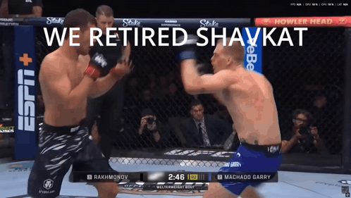Two Men Fighting In Cage Saying We Retired Shavkat GIF