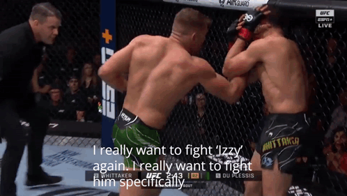 Two Men Fighting In Cage Want To Fight Izzy Again GIF