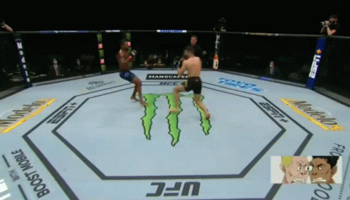 Two Men Fighting in Monster UFC Ring