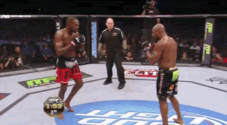 Two Men Fighting in UFC Ring