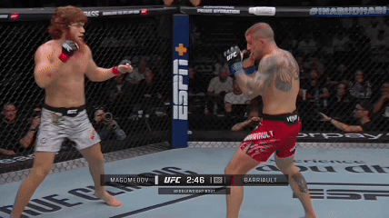 Two Men Fighting in UFC Ring With ESPN Logo