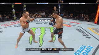 Two Men Fighting Monster in UFC Ring