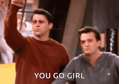 Two Men Fist Bumping Saying You Go Girl